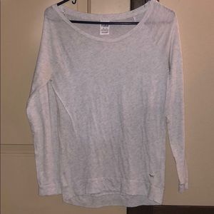 An XS Pink Victoria’s Secret grey t-shirt.